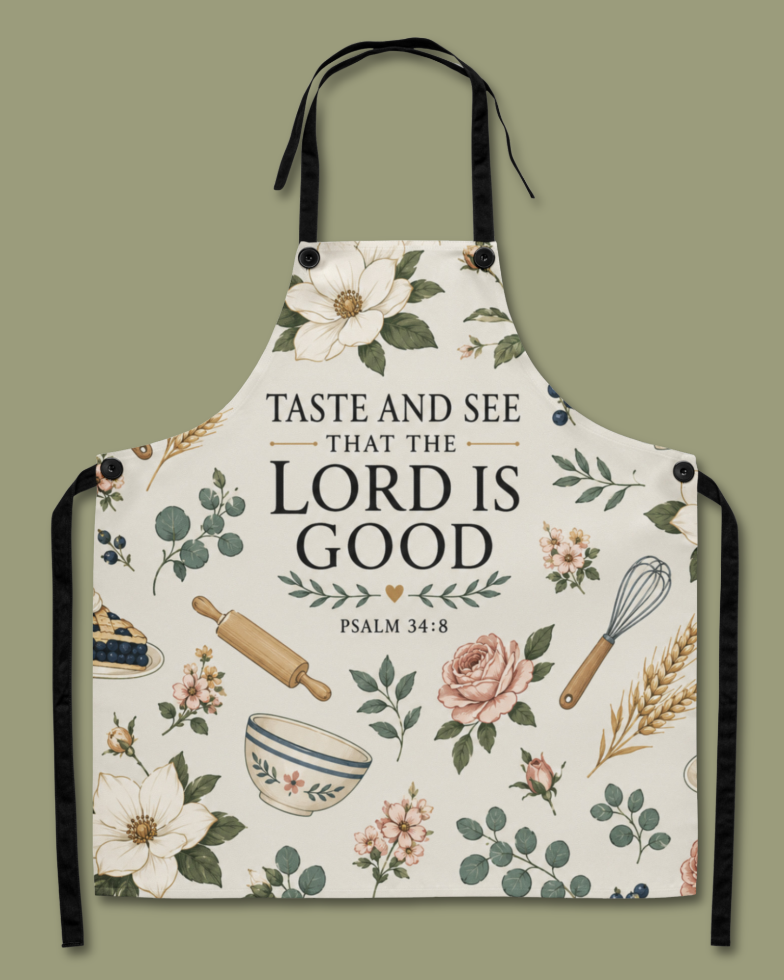 The Taste and See apron laid flat, showing the full cream design with magnolias, roses, eucalyptus, wheat, and baking tools around Taste and See That the Lord Is Good, Psalm 34:8.