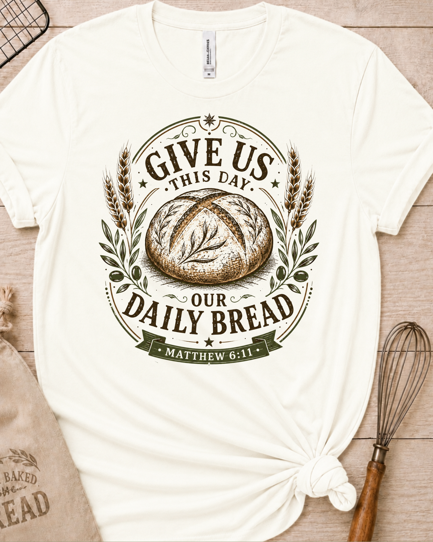 Vintage white women's relaxed fit t-shirt with the Daily Bread emblem, a clean badge-style bread illustration inspired by Matthew 6:11.