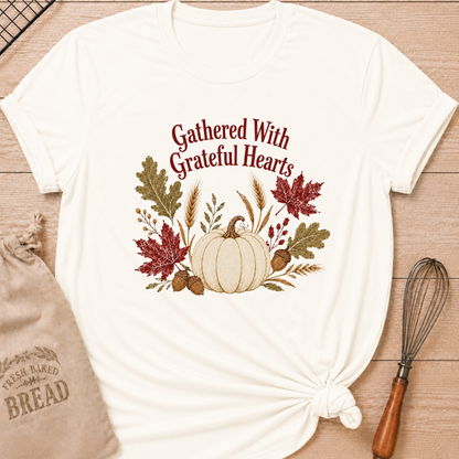 Vintage White women's relaxed fit tee with Gathered With Grateful Hearts lettering above a soft ivory pumpkin surrounded by wheat, acorns, berries and richly colored autumn leaves