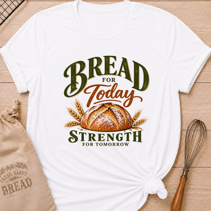 White women's relaxed fit tee with a golden artisan loaf and wheat in rich earthy tones, with bold vintage Bread for Today, Strength for Tomorrow lettering