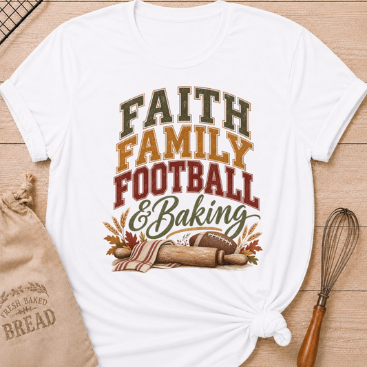 White women's relaxed fit tee with vintage collegiate Faith Family Football and Baking lettering above a rolling pin, football, wheat and autumn leaves in warm harvest tones