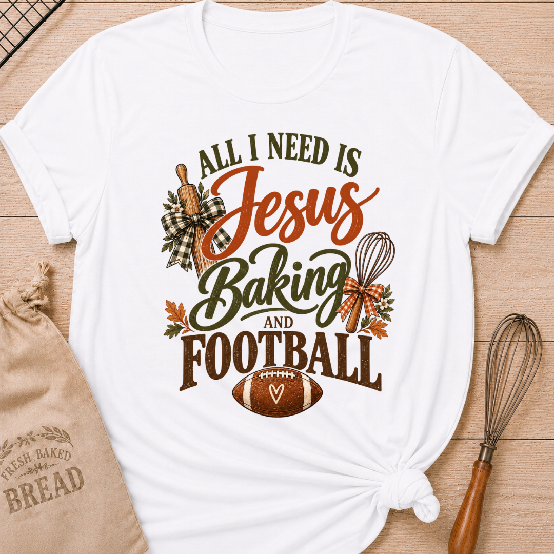 White women's relaxed fit tee with bold vintage All I Need Is Jesus Baking and Football lettering, a rolling pin, whisk, gingham bows, autumn leaves and a classic football