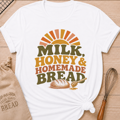 White Milk, Honey and Homemade Bread women's relaxed fit tee with vintage farm stand lettering, rising sun, artisan loaf, and honey dipper