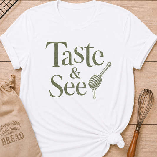 White women's relaxed fit t-shirt with the words Taste and See in vintage lettering and a dripping honey dipper.